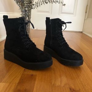 Black flat form combat boots